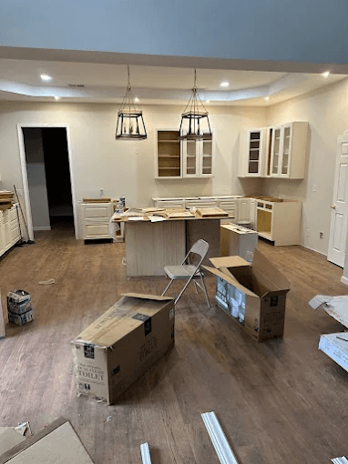 Mid-progress kitchen remodeling project in Newberry, SC by Cabinet Factory Plus, showing custom cabinet installation before final finishing touches.